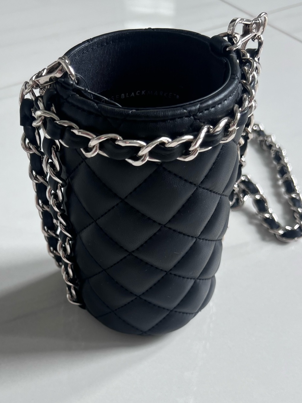 White House Black Market black quilted crossbody drink holder with silver chain